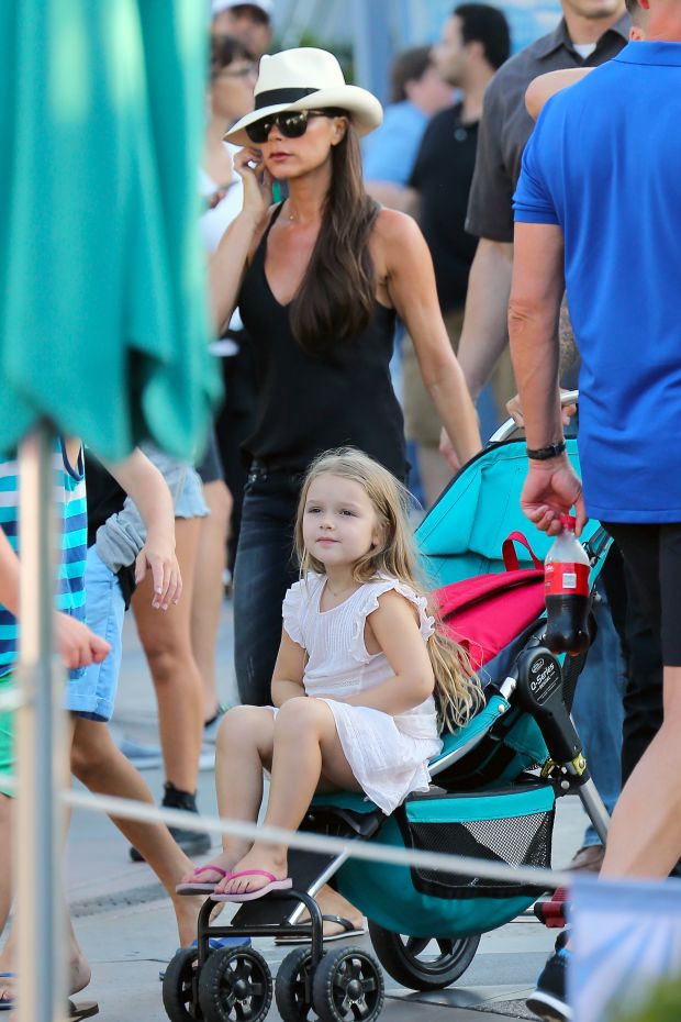 David and Victoria Beckham enjoy a day at Disneyland with their chilren