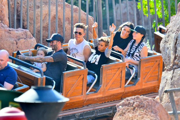 EXCLUSIVE: David Beckham takes a selfie with his daughter Harper as they ride Big Thunder Mountain Railroad at Disneyland