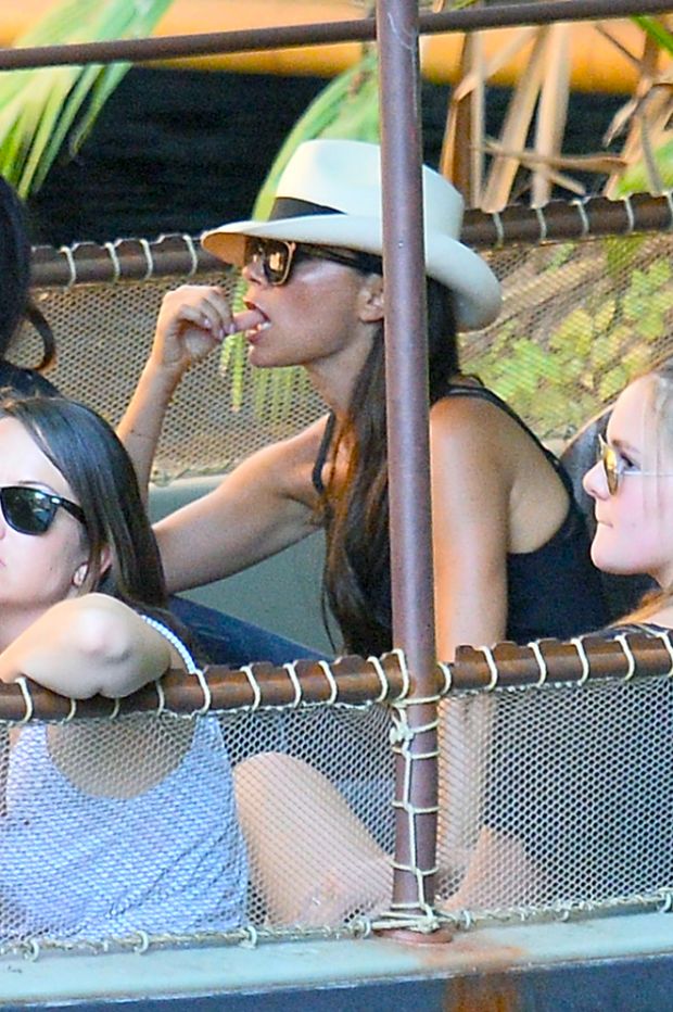 EXCLUSIVE: David Beckham shares a sweet moment with his daughter Harper as he and his family enjoy a ride on the Jungle Cruise at Disneyland (Blurred)