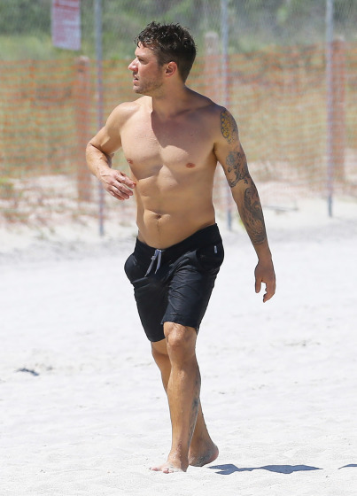 51445534 "Straight' A's" actor Ryan Phillippe shows off his fit physique while soaking up some sun in Miami, Florida with his girlfriend Paulina Slagter on June 9, 2014. 39 year old Ryan looks to be in the best shape of his life! FameFlynet, Inc - Beverly Hills, CA, USA - +1 (818) 307-4813