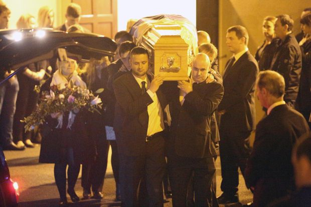 Family and Friends gather as the coffin of Cathriona White emerges from the White's Funerla Home in Cappawhite, Ireland.Ref: SPL1147898  091015  Picture by: Splash NewsSplash News and PicturesLos Angeles:	310-