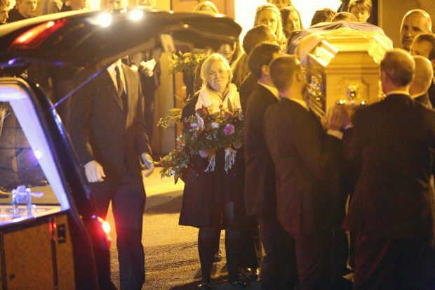 Family and Friends gather as the coffin of Cathriona White emerges from the White's Funerla Home in Cappawhite, Ireland.Ref: SPL1147898  091015  Picture by: Splash NewsSplash News and PicturesLos Angeles:	310-