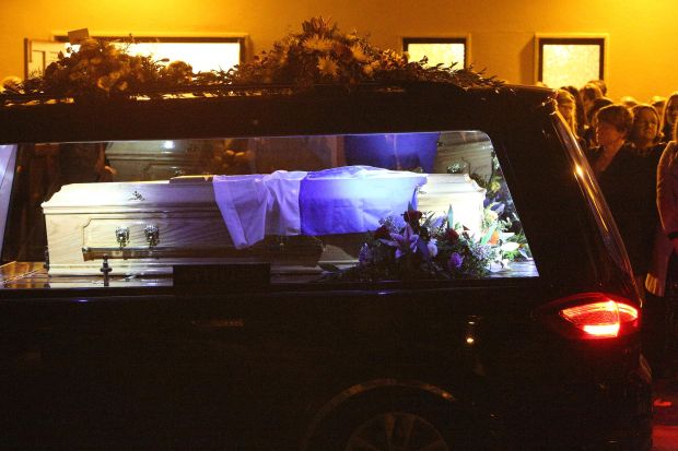 Family and Friends gather as the coffin of Cathriona White emerges from the White's Funerla Home in Cappawhite, Ireland.Ref: SPL1147898  091015  Picture by: Splash NewsSplash News and PicturesLos Angeles:	310-