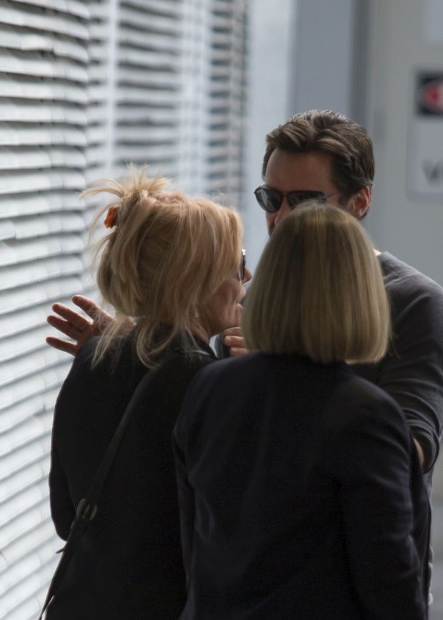 Hugh Jackman jets into Sydney with his whole family in tow.