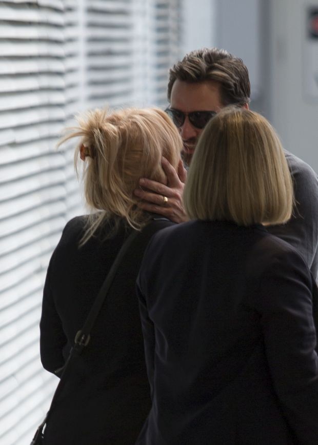 Hugh Jackman jets into Sydney with his whole family in tow.