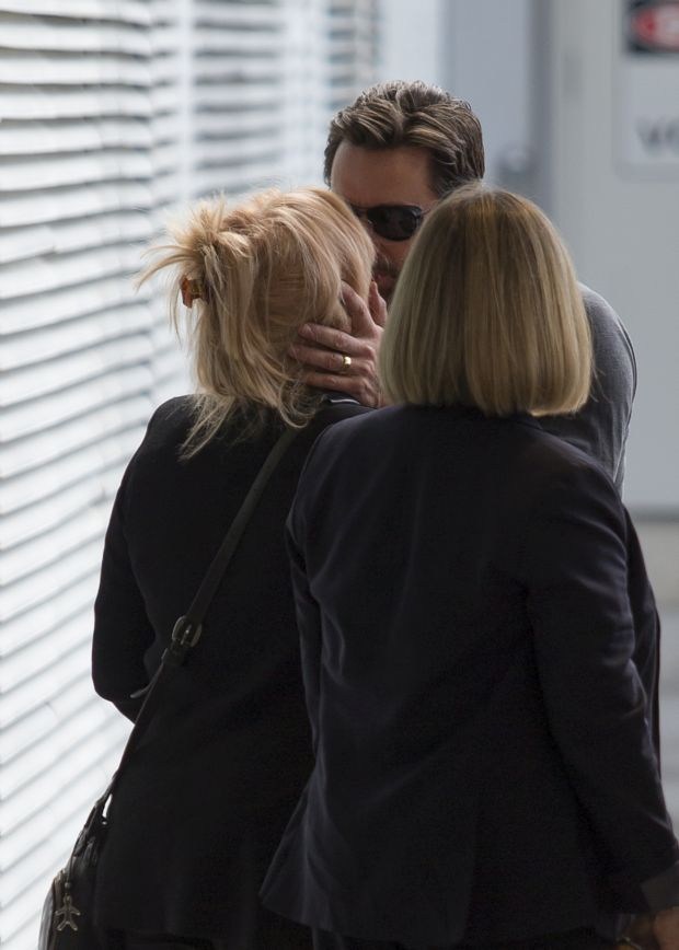 Hugh Jackman jets into Sydney with his whole family in tow.