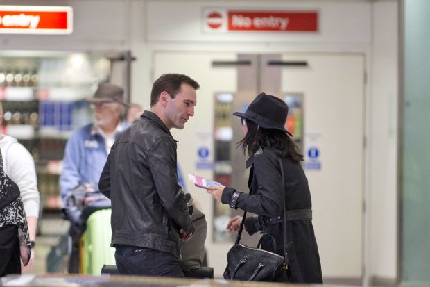 EXCLUSIVE: Courteney Cox and Johnny McDaid are back on as the pair kiss at Heathrow airport this afternoon.