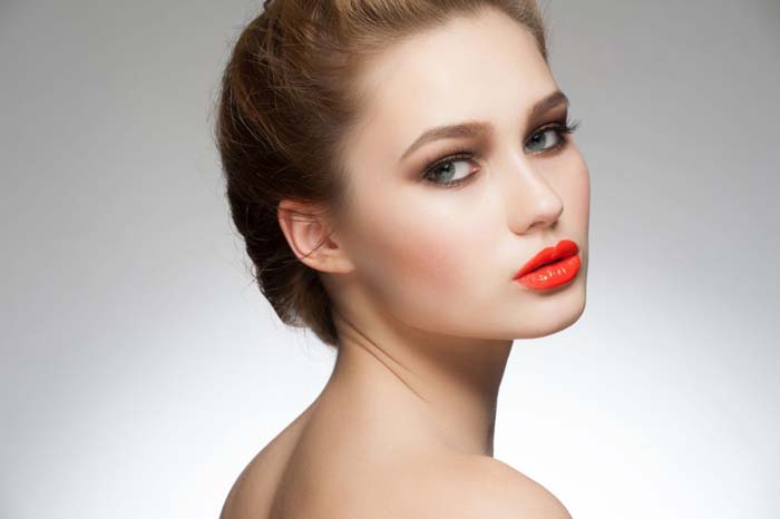 Woman with orange lipstick