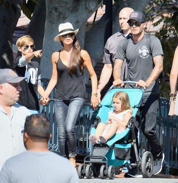 David and Victoria Beckham enjoy a day at Disneyland with their chilren