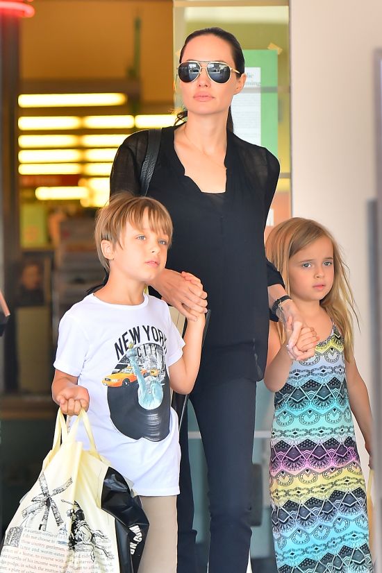 Angelina Jolie takes her children Knox and Vivian to buy their birthday gifts at a bookstore in studio city