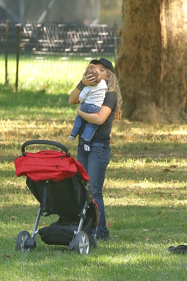 EXCLUSIVE: Shakira spotted trying to keep her balance while carrying her son Sasha Piquι Mebarak and talking on her cellphone while they where in Central Park in New York City Part 2