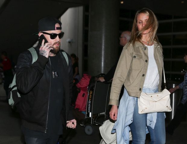 Cameron Diaz and Benji Madden are seen at LAX. in Los Angeles, California.Pictured: Cameron Diaz, Benji MaddenRef: SPL1113435  310815  Picture by: GVK/Bauergriffin.com