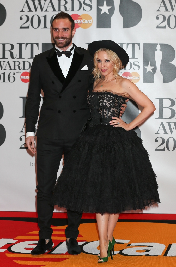 MANDATORY BYLINE: Jon Furniss / CorbisAdele attending The BRIT Awards arrivals at O2 Greenwich, London, Britain on 24 Feb 2016.Pictured: Kylie Minogue and Joshua SasseRef: SPL1234698  240216  Picture by: Jon Furniss / Corbis