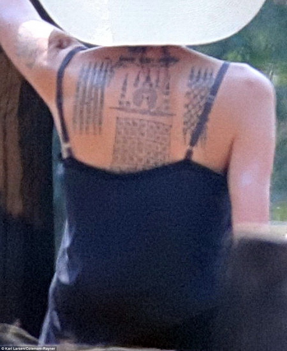 30F9880A00000578-3436271-Look_at_what_s_new_Angelina_Jolie_debuted_three_new_tattoos_on_h-a-126_1454885582610