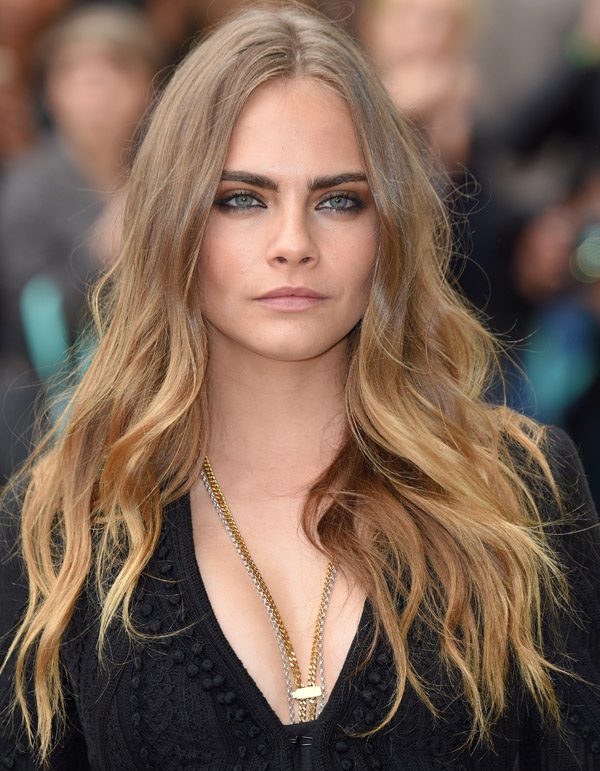 LONDON, ENGLAND - SEPTEMBER 21: Cara Delevingne attends the Burberry Prorsum show during London Fashion Week Spring/Summer 2016/17 at Kensington Gardens on September 21, 2015 in London, England. (Photo by Karwai Tang/WireImage)