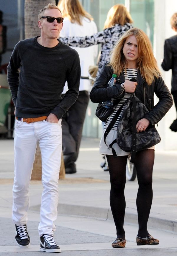 EXCLUSIVE: Billie Piper and husband, Laurence Fox, showed a public display of affection as they caught a movie together in Santa Monica. Laurence was playing with his wife's hair as they bought some snacks in the lobby. He also kissed her on her head before they went in to watch the film. Billie, who's hair was blown all over the place, sported black tights, white shorts, a black and white stripy top, leopard print flats and a black leather bikers jacket and appeared to have no make up on. They are currently in California with their son, Winton, who was no with them, giving the new parents a chance for a quick break. After the cinema Billie popped into a local supermarket to pick up some supplies carrying two shopping bags, her purse and car keys. It has ben reported that she may be in LA to meet with executives over plans to make 'Secret Diary of a Call Girl' into a movie. Pictured: Billie Piper and Laurence Fox Ref: SPL260454  230311   EXCLUSIVE Picture by: Splash News Splash News and Pictures Los Angeles: 310-821-2666 New York: 212-619-2666 London: 870-934-2666 photodesk@splashnews.com 