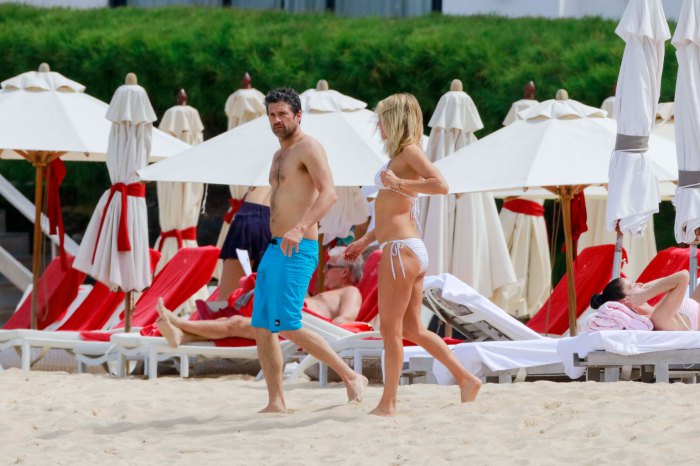 EXCLUSIVE: **PREMIUM EXCLUSIVE RATES APPLY* *STRICTLY NO WEB before 3 am EST FEB 19,2016* Patrick Dempsey  in blue boardshorts and his  wife Jillian  in a white bikini  have a  beach day in St Bart's Pictured: Patrick Dempsey Ref: SPL1230408  180216   EXCLUSIVE Picture by: Splash News Splash News and Pictures Los Angeles:310-821-2666 New York:212-619-2666 London:870-934-2666 photodesk@splashnews.com 