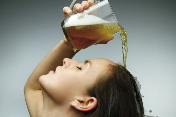 woman-pouring-beer-over-her-head