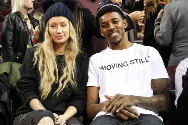 Iggy Azalea and LA Laker Nick Young caught on the 'Kiss Cam' courtside at the USC game