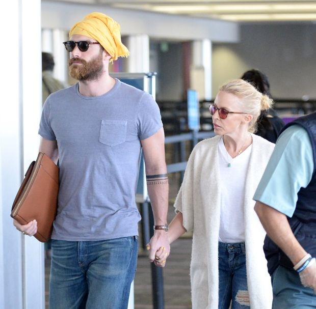 EXCLUSIVE: Romantic couple Kylie Minogue and fiancι Joshua Sasse arrive at LAX Airport