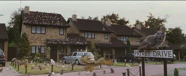 grabs from Harry Potter and the Philospher's Stone showing Privet Drive which is being sold for liz
