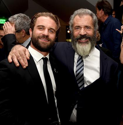 BEVERLY HILLS, CA - OCTOBER 24:  Director Mel Gibson (R) and his son actor Milo Gibson pose at the after party for a screening of Summit Entertainment's "Hacksaw Ridge" at the Academy of Motion Picture Arts and Sciences on October 24, 2016 in Beverly Hills, California.  (Photo by Kevin Winter/Getty Images)